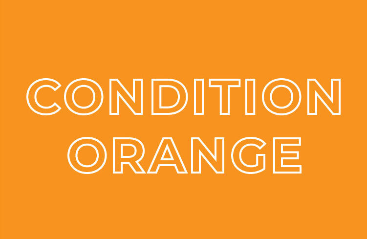 Condition Orange box representing heightened awareness in the color codes of self-defense awareness.