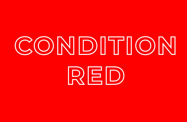 A visual representation of Condition Red in the color codes of awareness. This box signifies a state of immediate threat recognition and readiness for action, highlighting the importance of self-defense awareness.